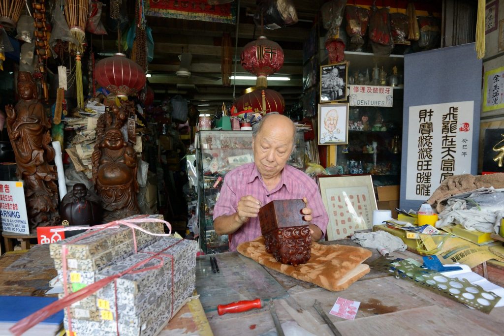 Chinese seal cutter and calligrapher, Ng Chai Tiam craft Traditional Craftsmanship in Penang You Should Check Out Mr Ng Chai Tiam min 1024x683
