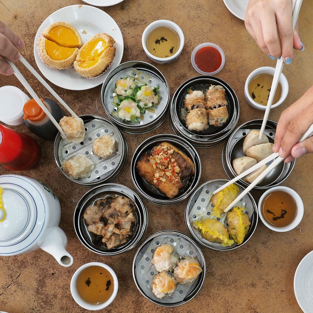 Different types of dim sum and tea served on a table