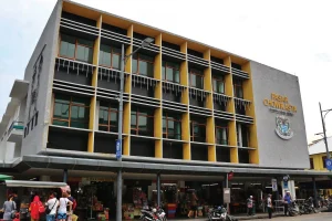 a building with a signage stating Pasar Chowrasta