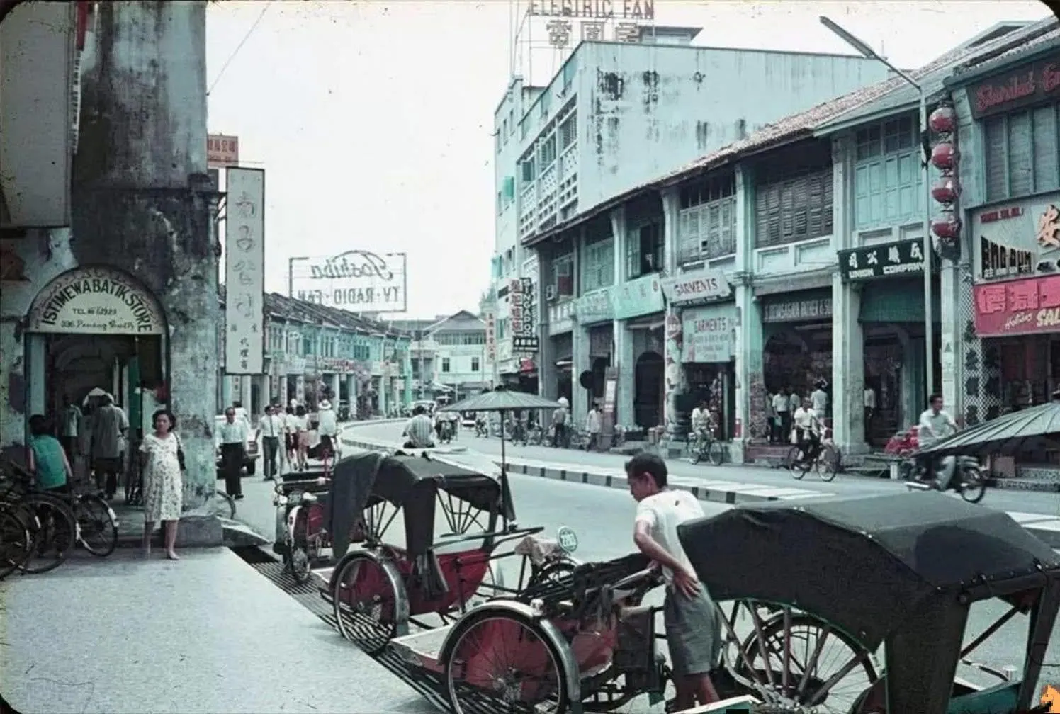 trishaws lining up by the streets of an old city