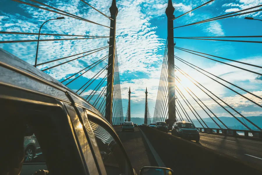vehicles crossing a bridge