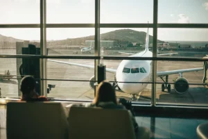 At the airport, a plane through the airport window