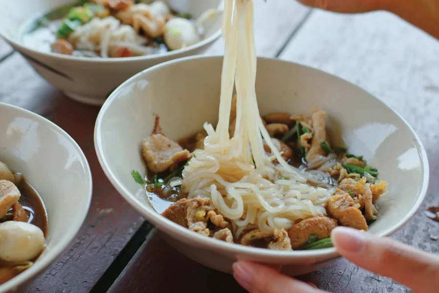 bowls of Thai boat noodles served and ready to eat