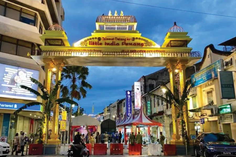an arch with a signage stating Little India Penang