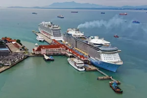 cruises and boats docking at a pier